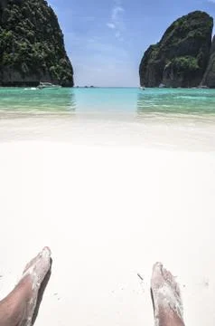 Feeds on beach view of maya bay, phi phi island, thailand Stock Photos