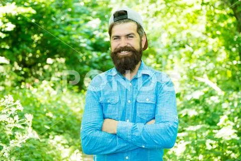 Feel happiness. guy in forest. summer camping. happy bearded man. Mature hipster Stock Photos