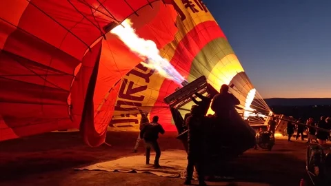 Feel the warmth and magic as a hot air balloon burner lights up. Stock Footage 262887043
