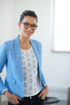 Feeling confident about my commitments. Young creative professional smiling at Foto stock