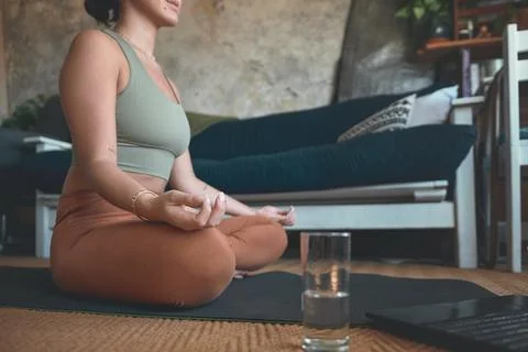 Feeling that next level kind of calm. Closeup shot of a woman meditating while Fotos de archivo