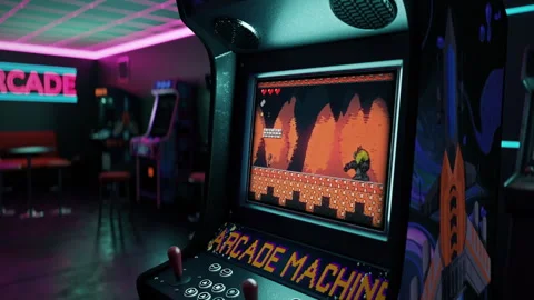 Feeling the nostalgia by playing the old arcade video game with pixel graphics Stock Footage 287467119