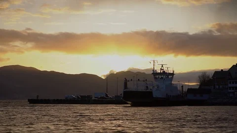 Feery at the docs in the sunset. Stock Footage 95144751