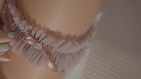 Fees of the bride, garter4 Stock Footage 128721340