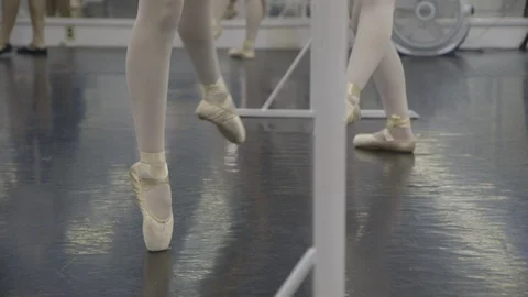 Feet of ballet dancers practicing Stock Footage 104867411