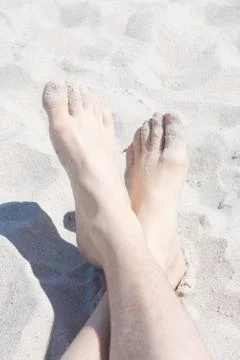 Feet on beach Stock Photos