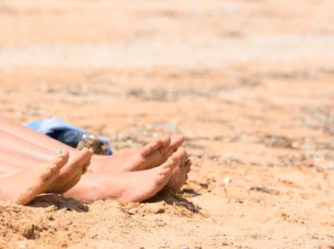 Feet on the beach Stock Photos