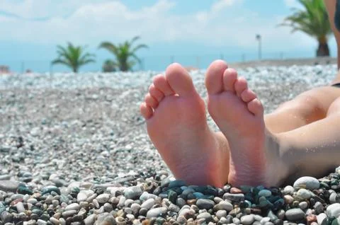 Feet on the beach Stock Photos