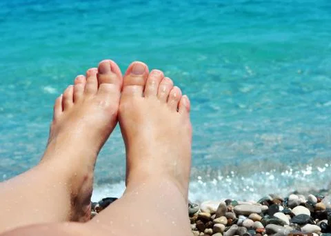 Feet on the beach Stock Photos