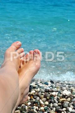Feet on the beach Stock Photos
