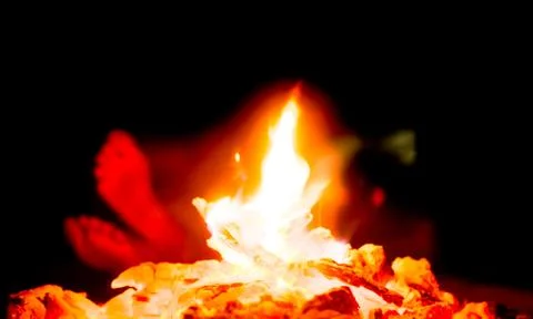 Feet by the camp fire Stock Photos