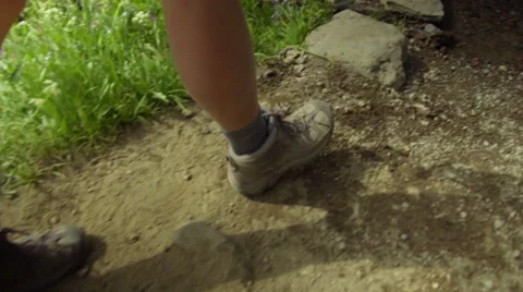 Feet crossing a stream Stock Footage 59081482
