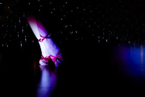 Feet dancer in disco Stock Photos