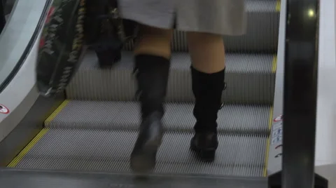 Feet on the escalator Stock Footage 50036325