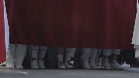Feet of float bearers carrying a holy week pass in Spain. Video stock 105734182