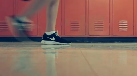 Feet Frantically Walking Through A School's Hallway With Audio Stock Footage 56623617