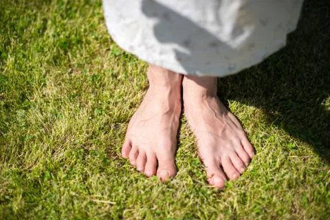 Feet on grass Stock Photos