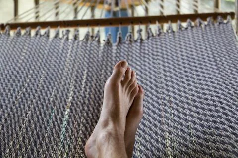 Feet in hammock Stock Photos
