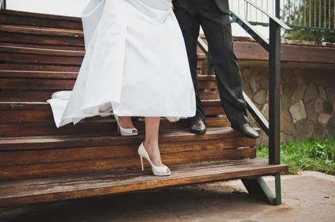 Feet on a ladder  Stock Photos