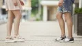 Feet of male and female coming to each other, girl raising on tiptoes, dating 4k or 4k+ Resolution