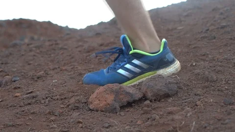 Feet of man running Stock Footage 107325722
