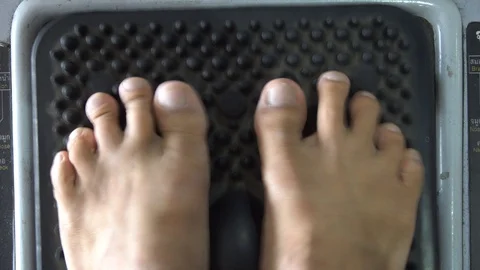 Feet on massage machine. Video stock 95867277