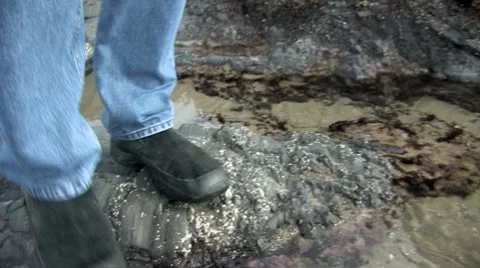 Feet over Rock Stock Footage 9448723