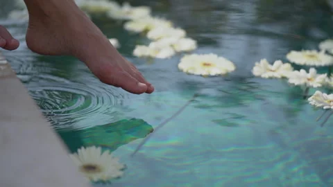 Feet in the pool Stock Footage 157310305