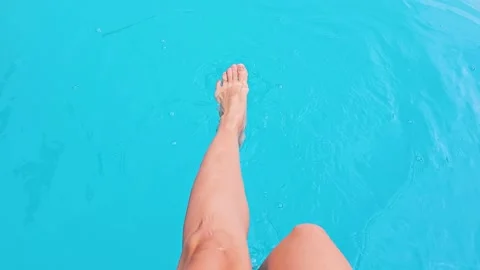 Feet in the pool Stock Footage 314908639