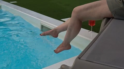 Feet in the pool Stock-Footage 342593196
