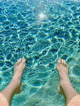 Feet In Pool Stock Photos