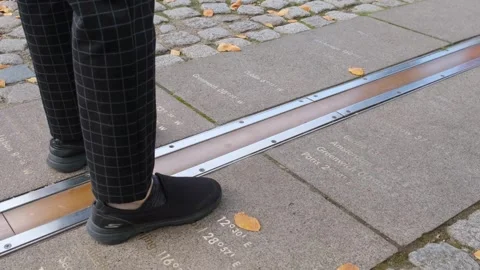 Feet positioned on either side of the Greenwich meridian Stock Footage 293085271
