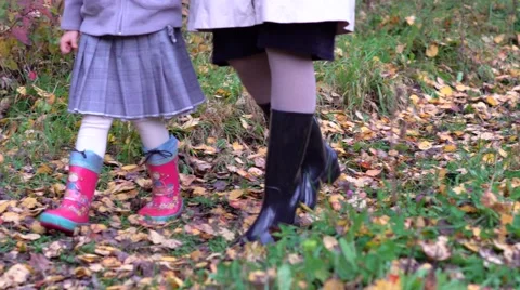 Feet in rubber boots Stock Footage 68421357