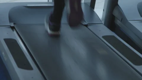 Feet run on treadmill Stock Footage 235441601