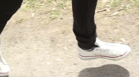 Feet running along the path playing sports Stock Footage 49408348