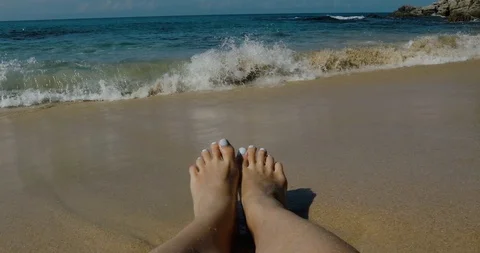 Feet in the sand on the beach Stock Footage 100463991