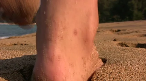 Feet in the sand closeup 動画素材 1083425