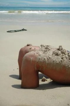 Feet  in the sand 库存照片