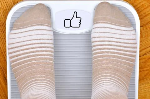 Feet on the scale Stock Photos
