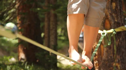 Feet on slackline Stock Footage 37624260