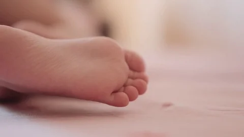 Feet of a sleeping child. Stock Footage 80008030