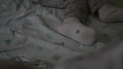 Feet of sleeping child Stock Footage 86509969