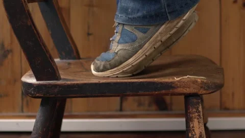 Feet standing on stool on tip toes Stock Footage 278030125