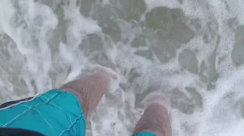 Feet in surf Stock Footage 38058963