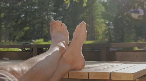 Feet Up On Table, crossing the legs Stock Footage 53869824