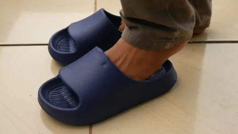 Feet take off or remove blue sandals Stock-Footage 301490685