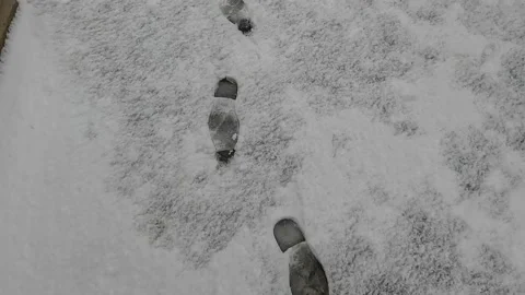 Feet trace Walking In Snow Stock Footage 236615768