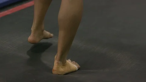 Feet on a trampoline Stock Footage 106590846