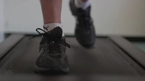 Feet on treadmill Stock Footage 10716793