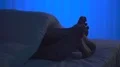 The feet under a cover on the bed. night time 4k or 4k+ Resolution